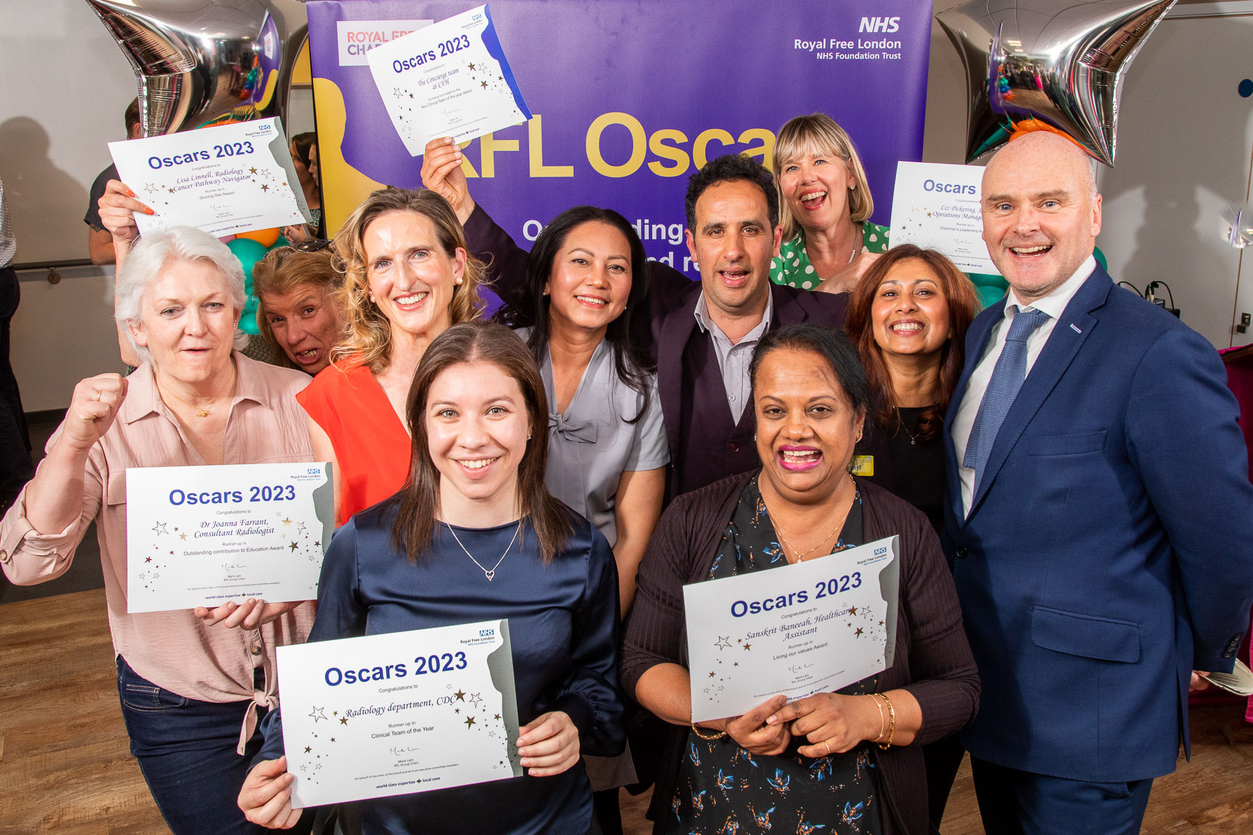 Runners up posing with their certificates