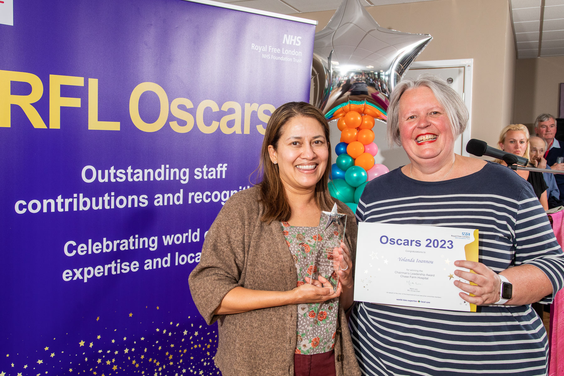 Yolanda posing with her award and certificate alongside Julia Kitteringam